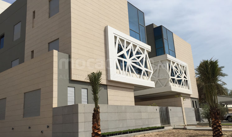 Beige limestone cladding in the Gulf region