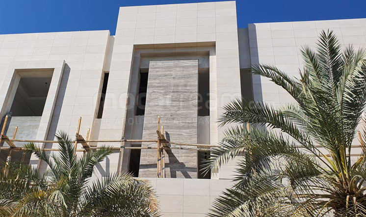 Beige limestone cladding in the Gulf region